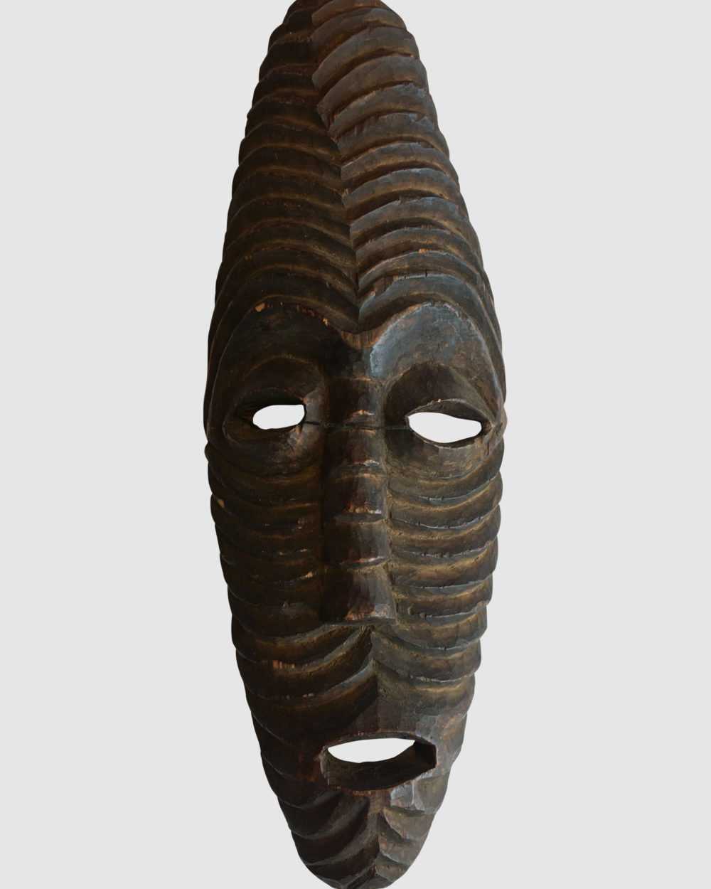 masque Africain sculpté et strié